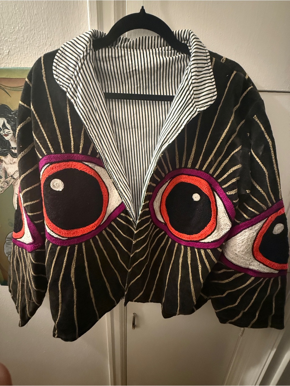 Velvet embroidered jacket with eyes